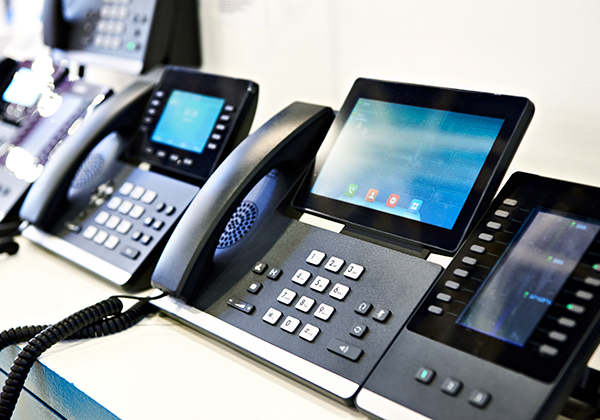 Image of desk phones with VoIP connectivity